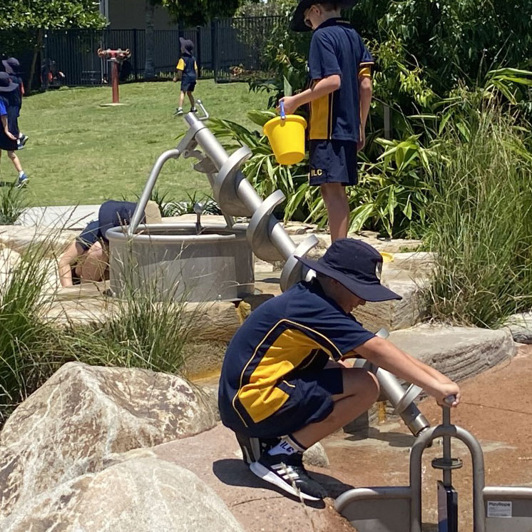 Eco-Education at Immanuel Lutheran College. Children play with our simulated river where we teach conservation and physics