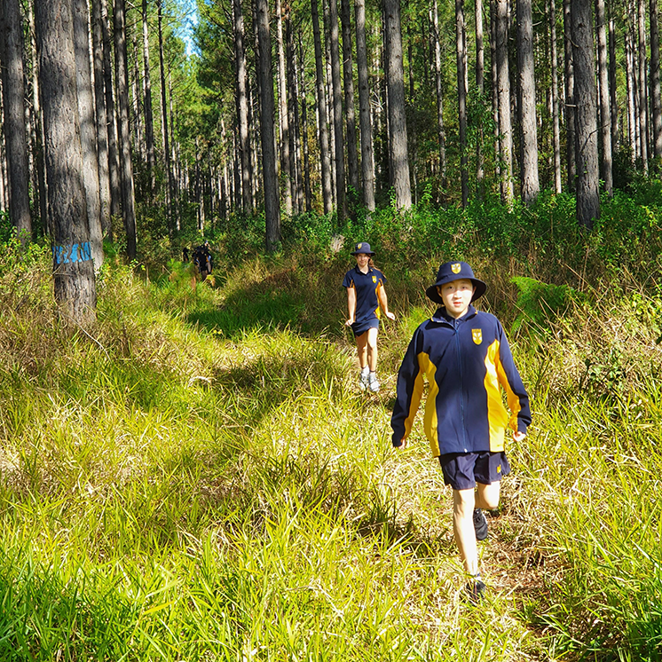 High school students learning orienteering at our Mt Binga campus