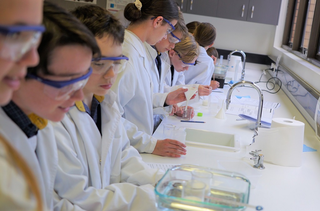 Students using laboratory facilities.